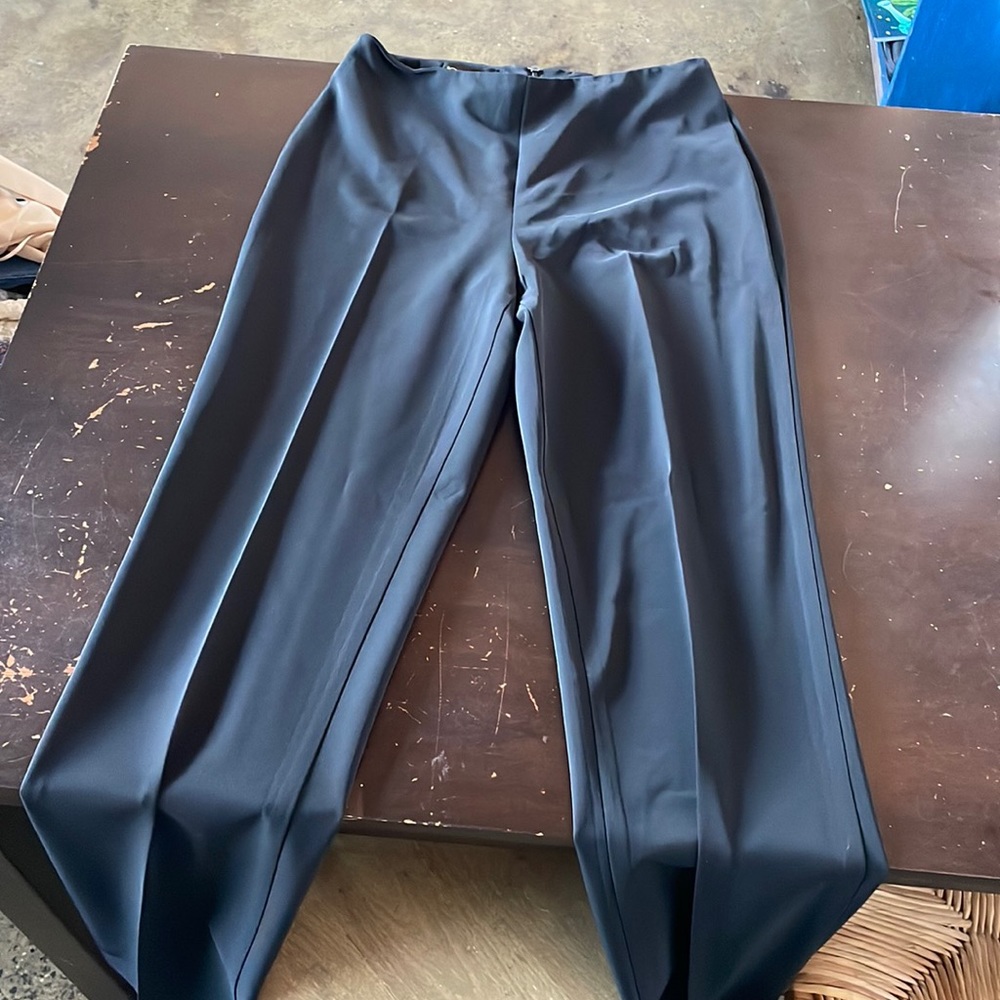 Really sexy Bebè straight leg slacks in size 2. Great condition